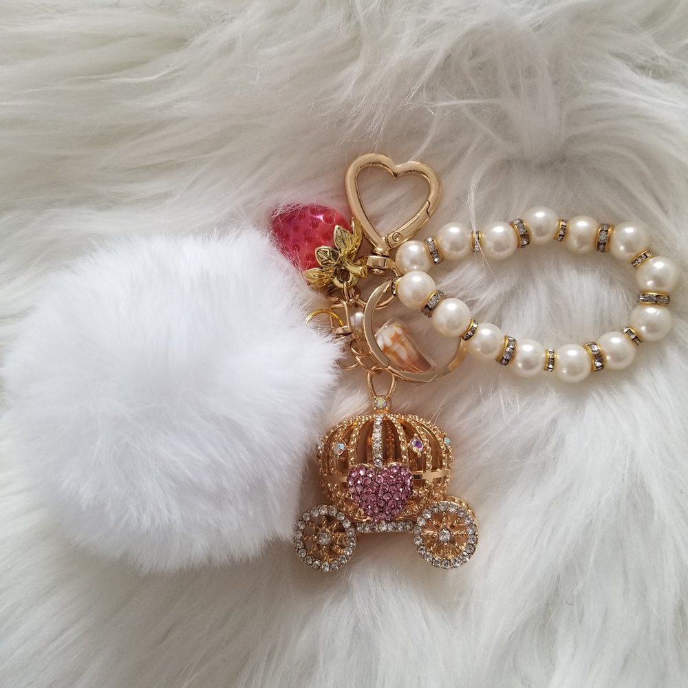 *NWT* Chic White Pom Pom Keychain with Gold Carriage